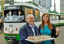 Owner Suzanne Knegt and her catering partner, Ad Janssen, welcome sightseers aboard the new RotterTram dining tram in Rotterdam, Netherlands.