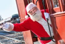 Santa waving from a Strasburg Rail Road Christmas Train