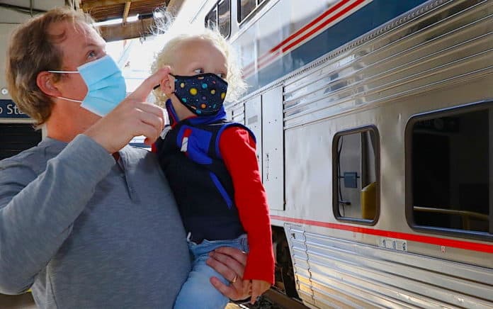 Father and son in Amtrak station
