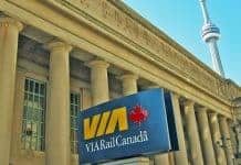 In view of the CN Towerv VIA Rail's familiar logo welcomes train travelers to Toronto's Union Station.