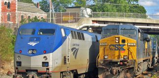 CSX train gaining on Amtrak's Lakeshore Limited, Palmer, Massachusetts.