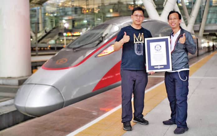 Record-setting brothers on train platform