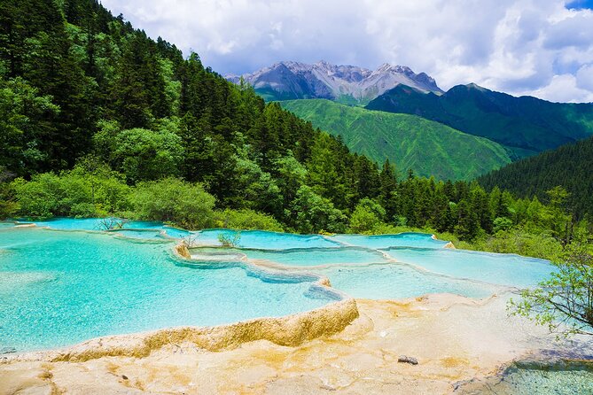 Chengdu Side Trip to Fairy Jiuzhaigou - Transition to Jiuzhaigou: Huanglong Scenic Valley
